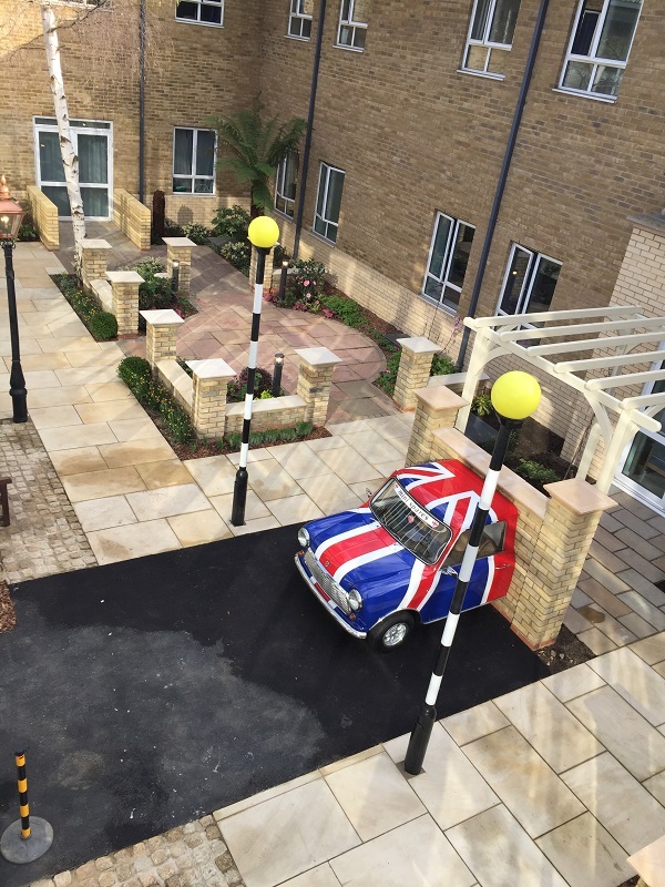 Manor metal railings installed to brick pillars 