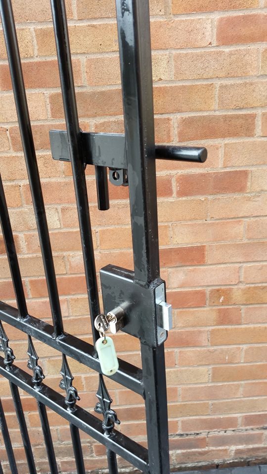 Corfe side gate fitted with weld in security lock