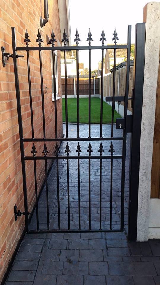 Corfe metal side gate in a made to measure size fitted to side entrance of garden