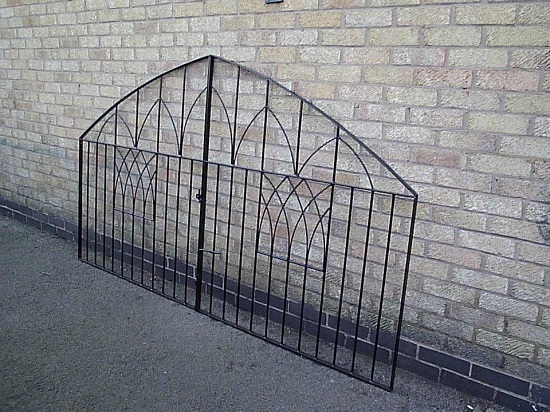 Custom built wrought iron driveway gates