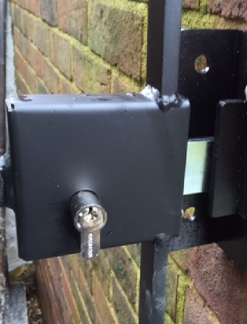 A metal gate fitted with a key operated lock is secure and convenient to use