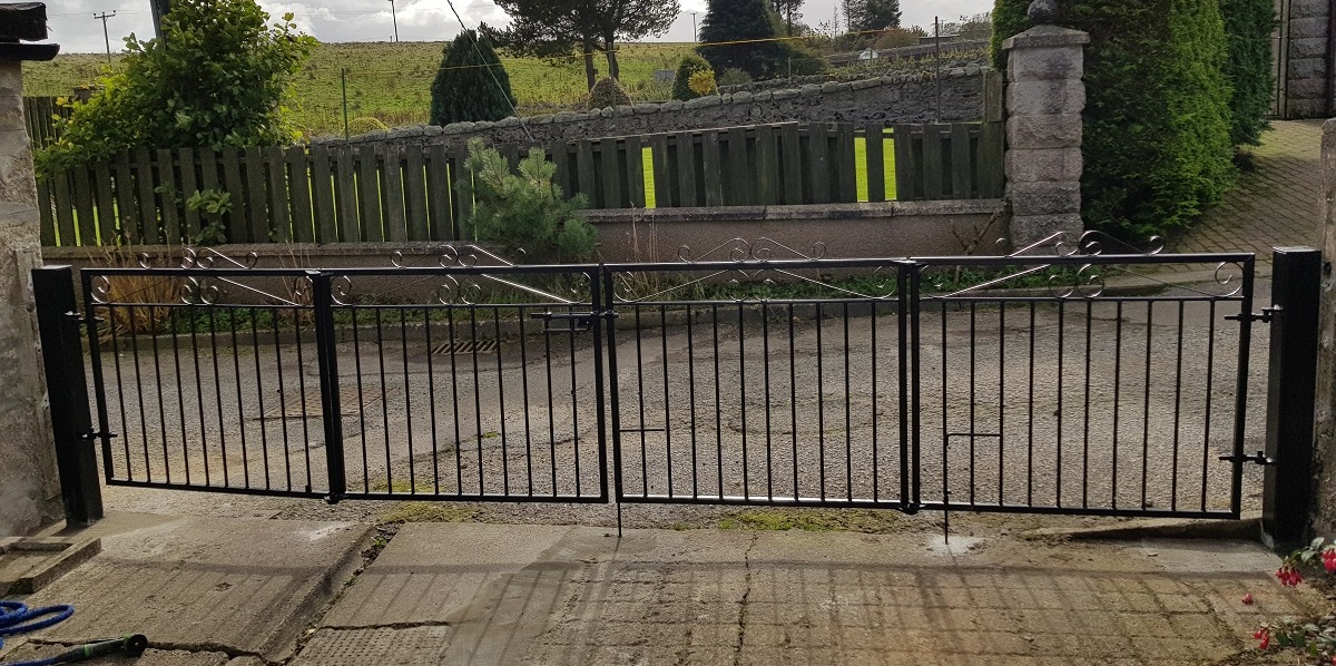 Bi folding gates fitted to metal posts