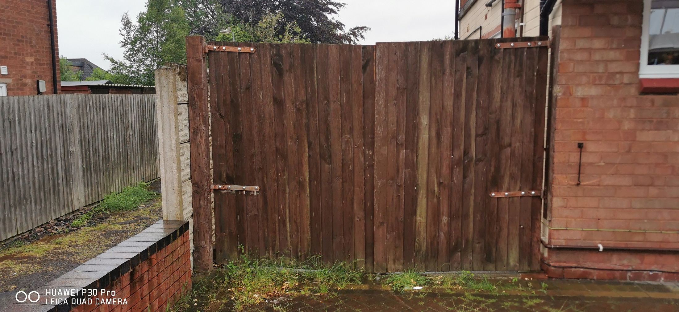 Old wooden gates in need of replacement